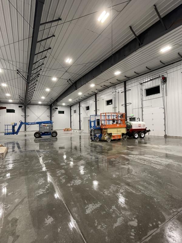 Wide hangar floor after the final clean