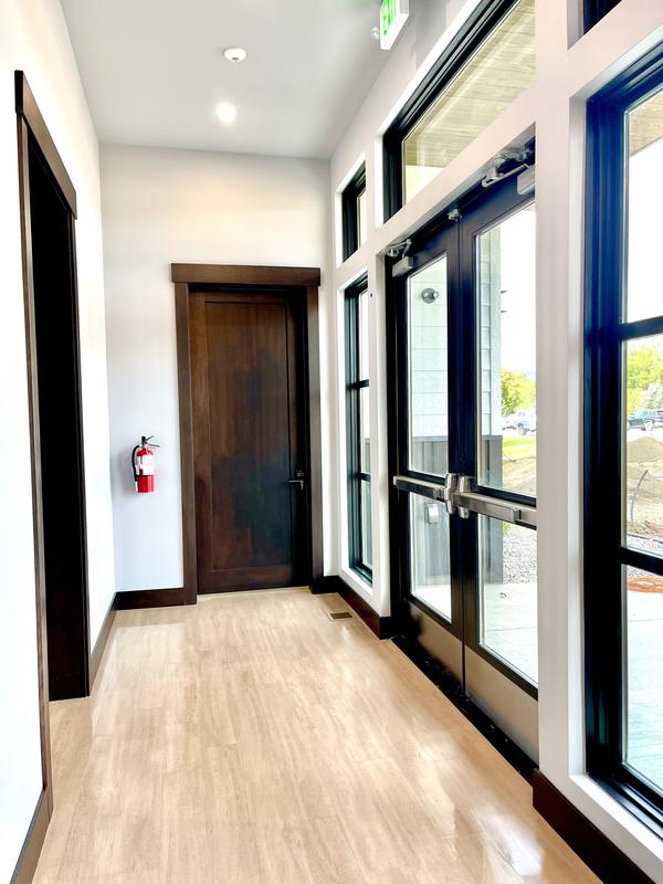 Bright entry corridor with glass doors